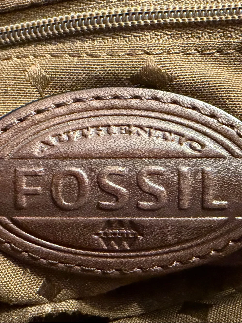 Fossil leather Fold over Explorer.